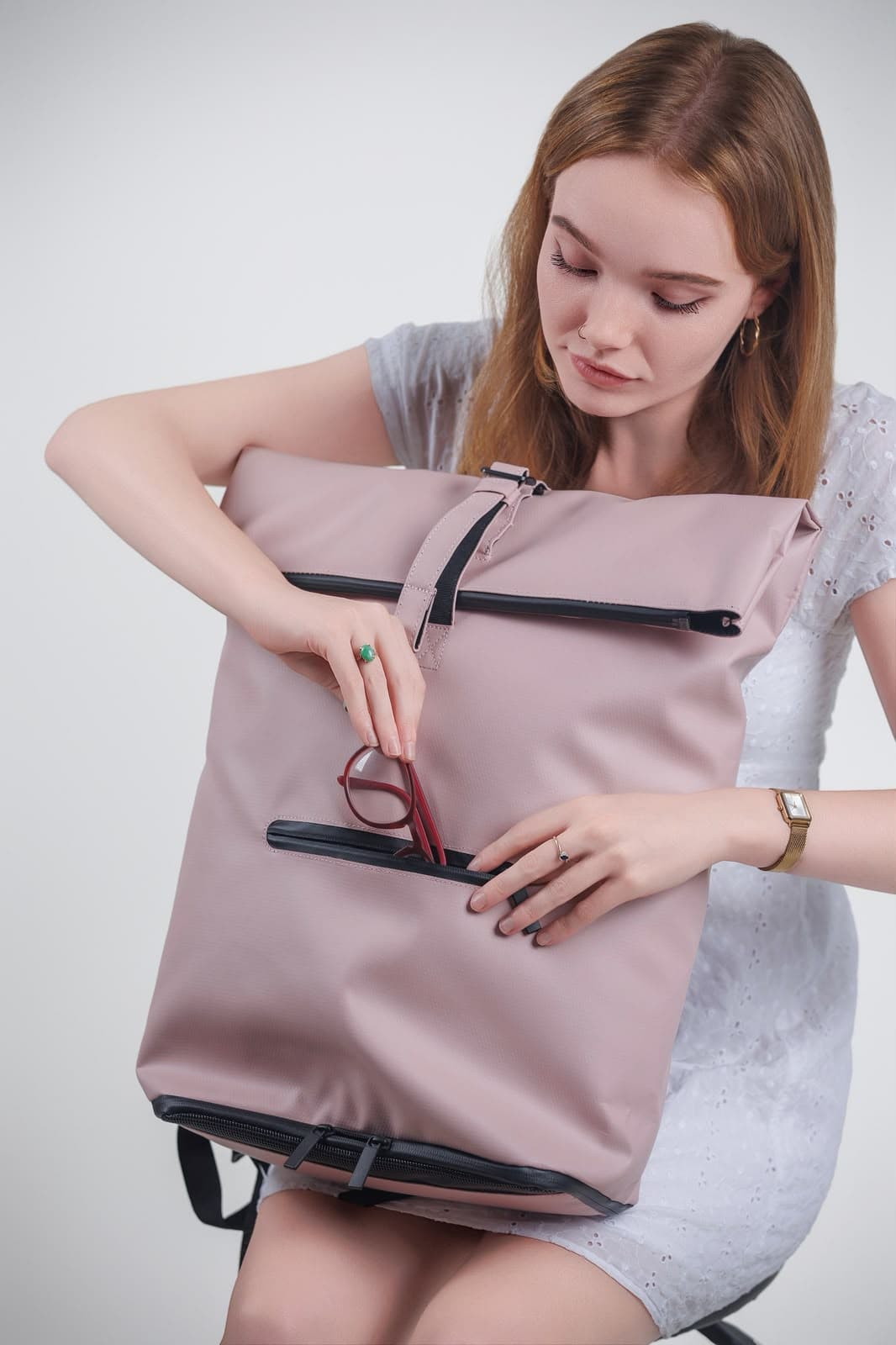 Model wearing NORJ white backpack
